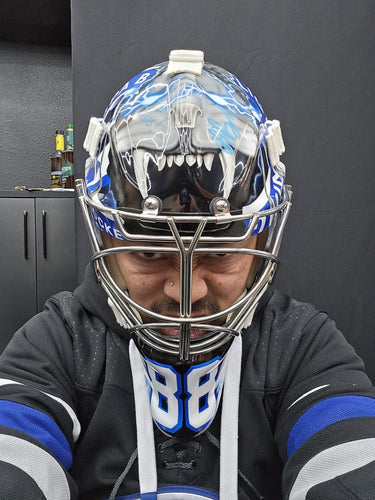 A Goalie Mask Signing Session Anecdote about Andrei Vaslievskiy