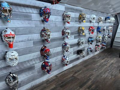 "A Mind Blowing Display of Goalie Masks Wall"