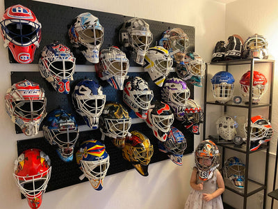 A CLIENT'S GOALIE MASK WALL OF GREATNESS