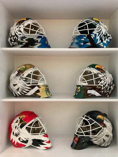 CLIENTS' COLLECTIONS: ED BELFOUR SIGNED GOALIE MASKS