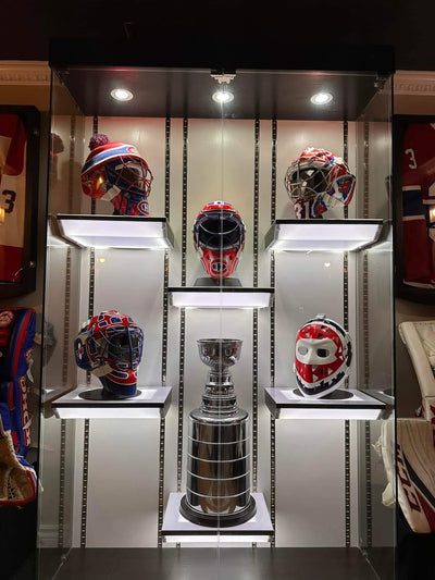 An incredible Montreal Canadiens Goalie Mask Display Man Cave