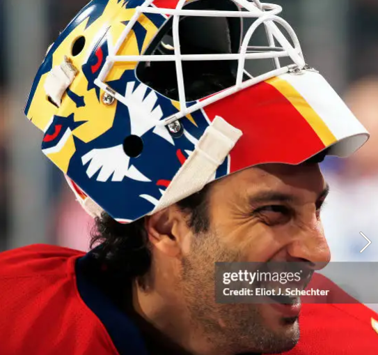Goalie wearing the mask in a reference photo for Roberto Luongo Goalie Mask Signed 2017 Florida Signature Edition Tribute. Goalie Mask Collector.