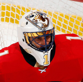 Goalie wearing the mask in a reference photo for Roberto Luongo Goalie Mask Signed 2018 Florida Signature Edition Tribute (). Goalie Mask Collector.