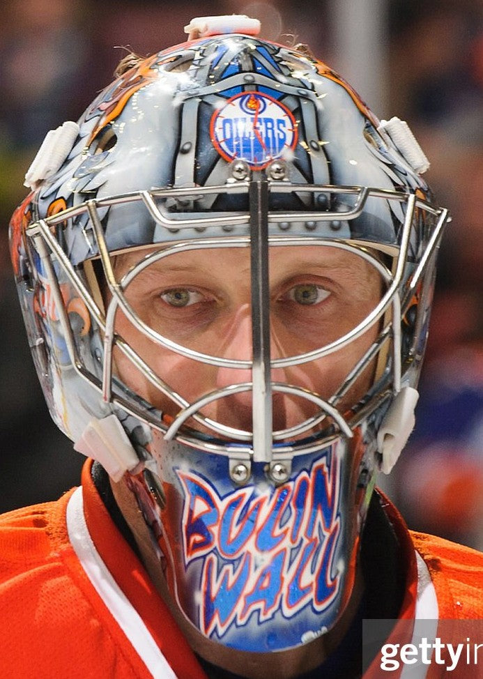 Goalie wearing the mask in a reference photo for Nikolai Khabibulin Signed Goalie Mask 2013 Edmonton Signature Edition Tribute. Goalie Mask Collector.