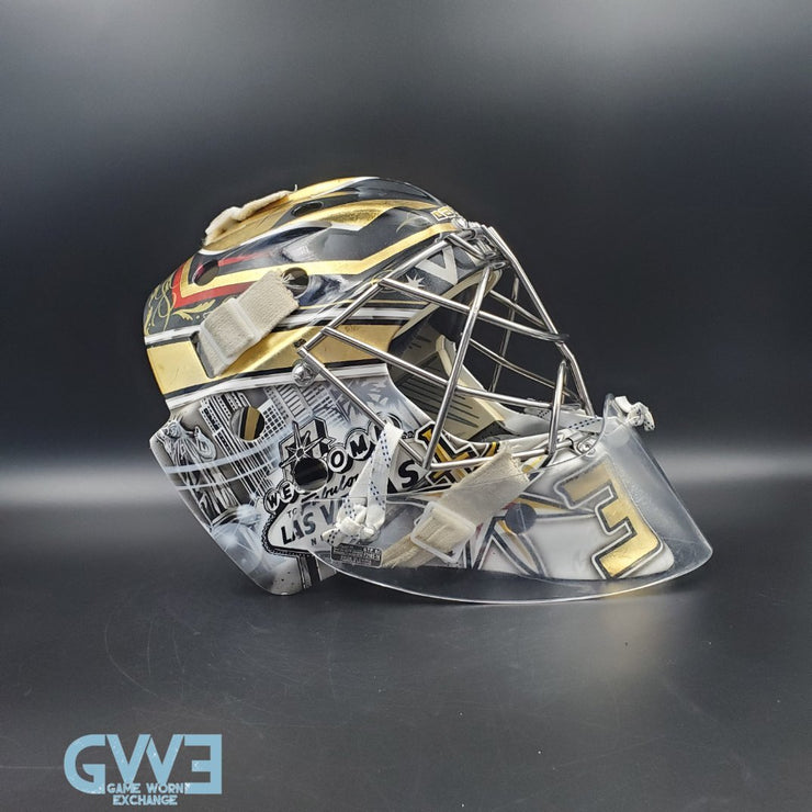 Logan Thompson Game Worn Goalie Mask 2021-22 Las Vegas Golden Knights Painted by Dave Fried Friedesigns on Bauer Shell Photomatched AS-03152