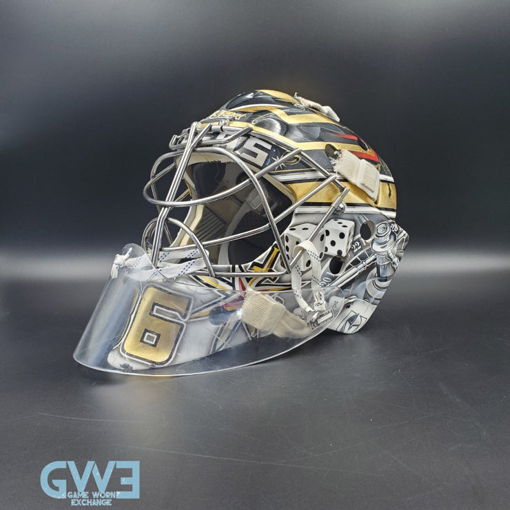 Logan Thompson Game Worn Goalie Mask 2021-22 Las Vegas Golden Knights Painted by Dave Fried Friedesigns on Bauer Shell Photomatched AS-03152