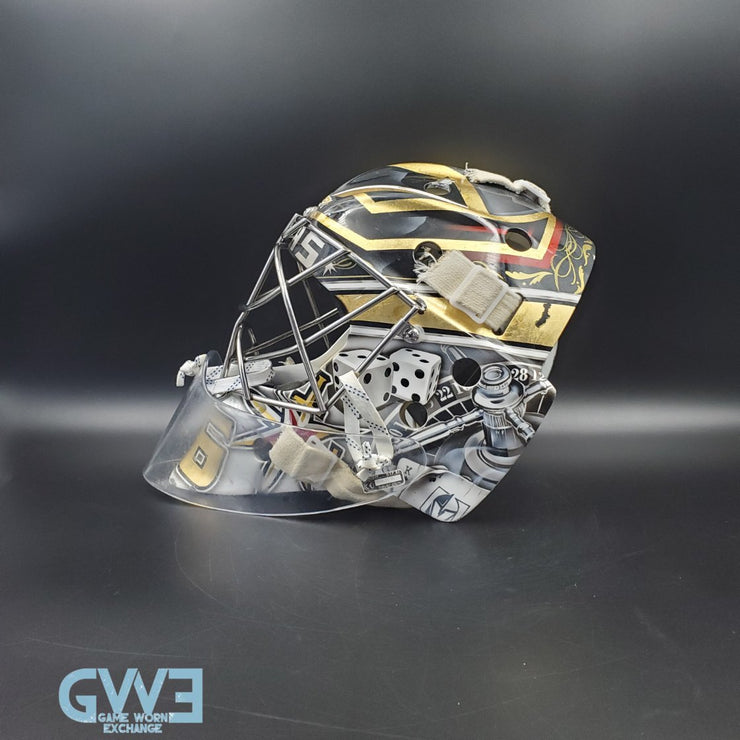 Logan Thompson Game Worn Goalie Mask 2021-22 Las Vegas Golden Knights Painted by Dave Fried Friedesigns on Bauer Shell Photomatched AS-03152