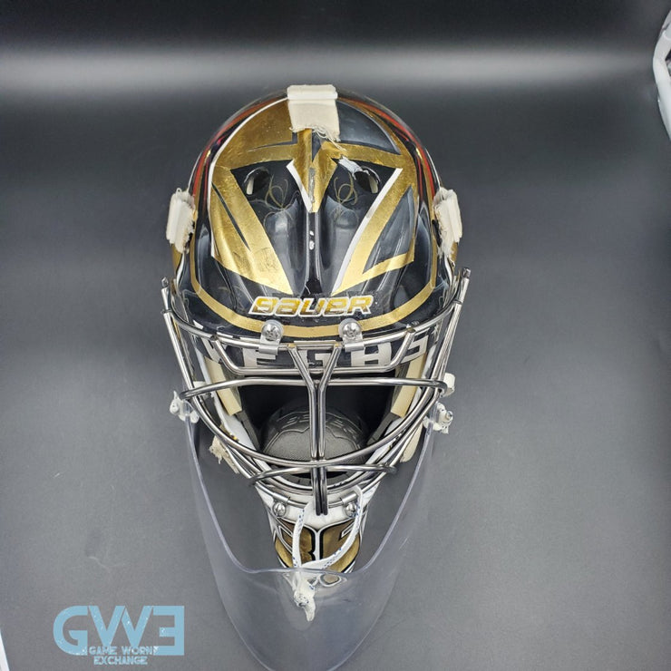 Logan Thompson Game Worn Goalie Mask 2021-22 Las Vegas Golden Knights Painted by Dave Fried Friedesigns on Bauer Shell Photomatched AS-03152