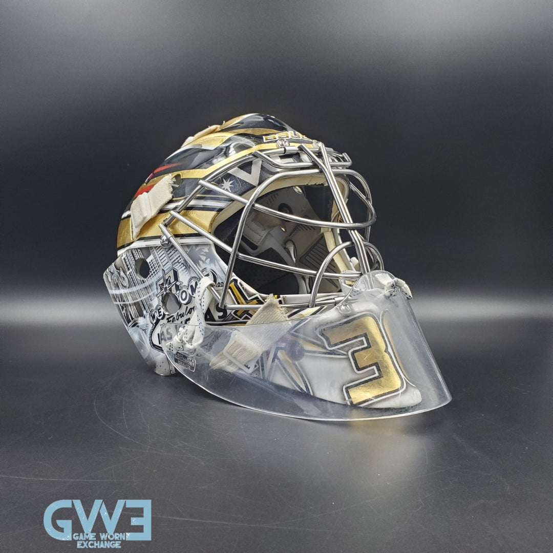 Logan Thompson Game Worn Goalie Mask 2021 22 Las Vegas Golden Knights Painted by Dave Fried Friedesigns on Bauer Shell Photomatched. Goalie Mask Collector.