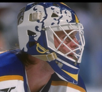 Goalie wearing the mask in a reference photo for Daren Puppa Signed Goalie Mask Buffalo V2 Signature Edition. Goalie Mask Collector.