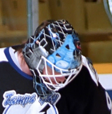 Goalie wearing the mask in a reference photo for Daren Puppa Signed Goalie Mask Tampa Bay V1 Signature Edition. Goalie Mask Collector.