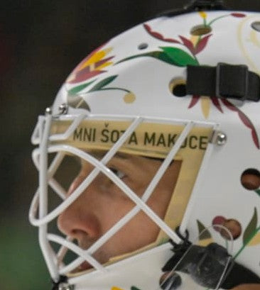 Goalie wearing the mask in a reference photo for Marc Andre Fleury Goalie Mask Unsigned 2023 Minnesota Native American Heritage Tribute. Goalie Mask Collector.