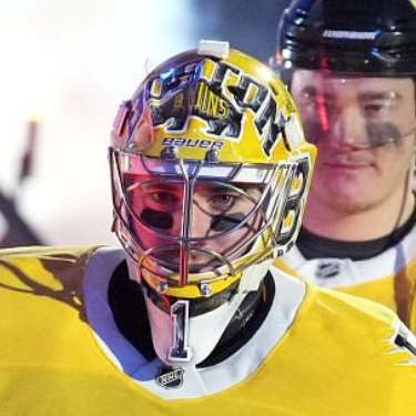 Goalie wearing the mask in a reference photo for Jeremy Swayman Signed Goalie Mask 2026 STADIUM SERIES Signature Edition. Goalie Mask Collector.
