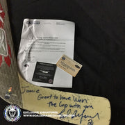 ED BELFOUR GAME USED STICK SIGNED RBK REEBOK COMMEMORATING  "THE 1999 STANLEY CUP CHAMPIONS DALLAS STARS" -INSCRIPTION DEDICATED TO HIS TEAMMATE  JAMIE LANGENBRUNNER "JAMIE GREAT TO HAVE WON THE CUP WITH YOU" AS-01198 - SOLD