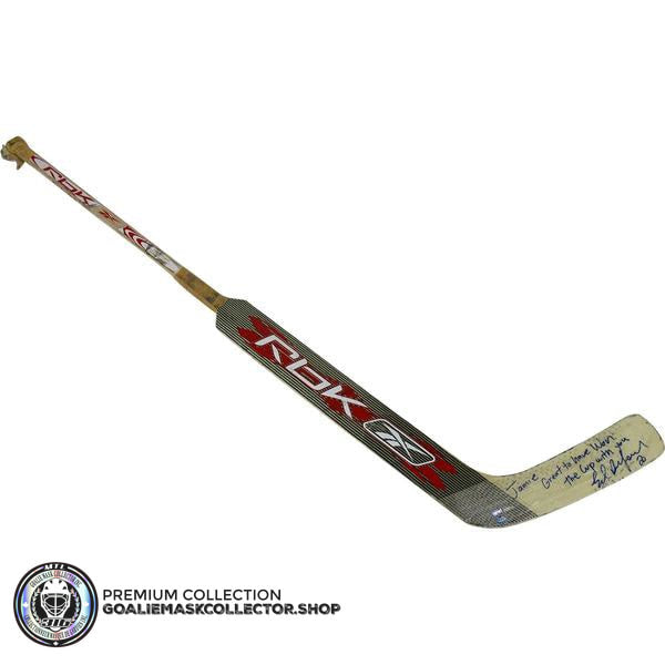 ED BELFOUR GAME USED STICK SIGNED RBK REEBOK COMMEMORATING  "THE 1999 STANLEY CUP CHAMPIONS DALLAS STARS" -INSCRIPTION DEDICATED TO HIS TEAMMATE  JAMIE LANGENBRUNNER "JAMIE GREAT TO HAVE WON THE CUP WITH YOU"